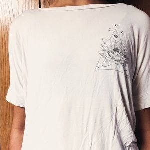 Oversized white shirt with flower/moon detailing